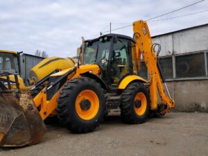 Экскаватор-погрузчик JCB 5CX в аренду с оператором
