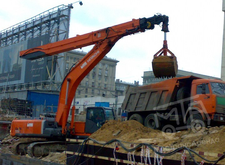 Гусеничный экскаватор с грейфером 26 метров в аренду с оператором