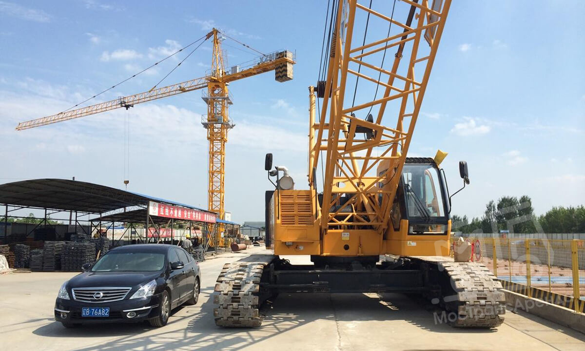 Gusenichnyy kran xcmg xgc75 в аренду с оператором
